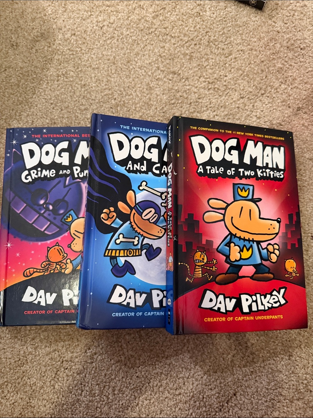 Scholastic Dog Man Hardcover Set - Red, Blue, Purple Covers